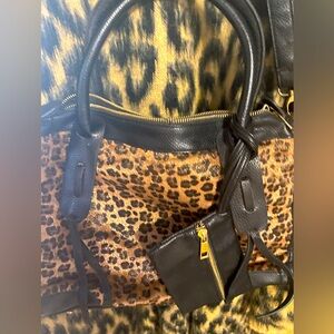 Ladies fashion leather and faux animal print handbag